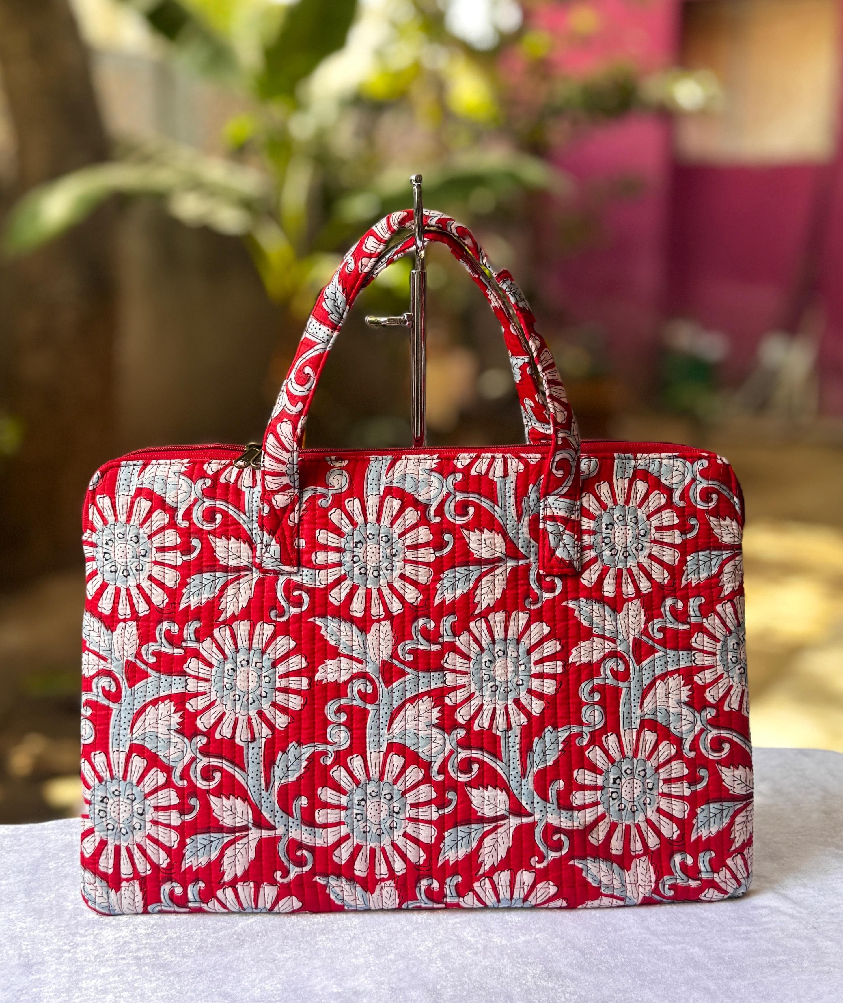 Quilted hand printed laptop bag