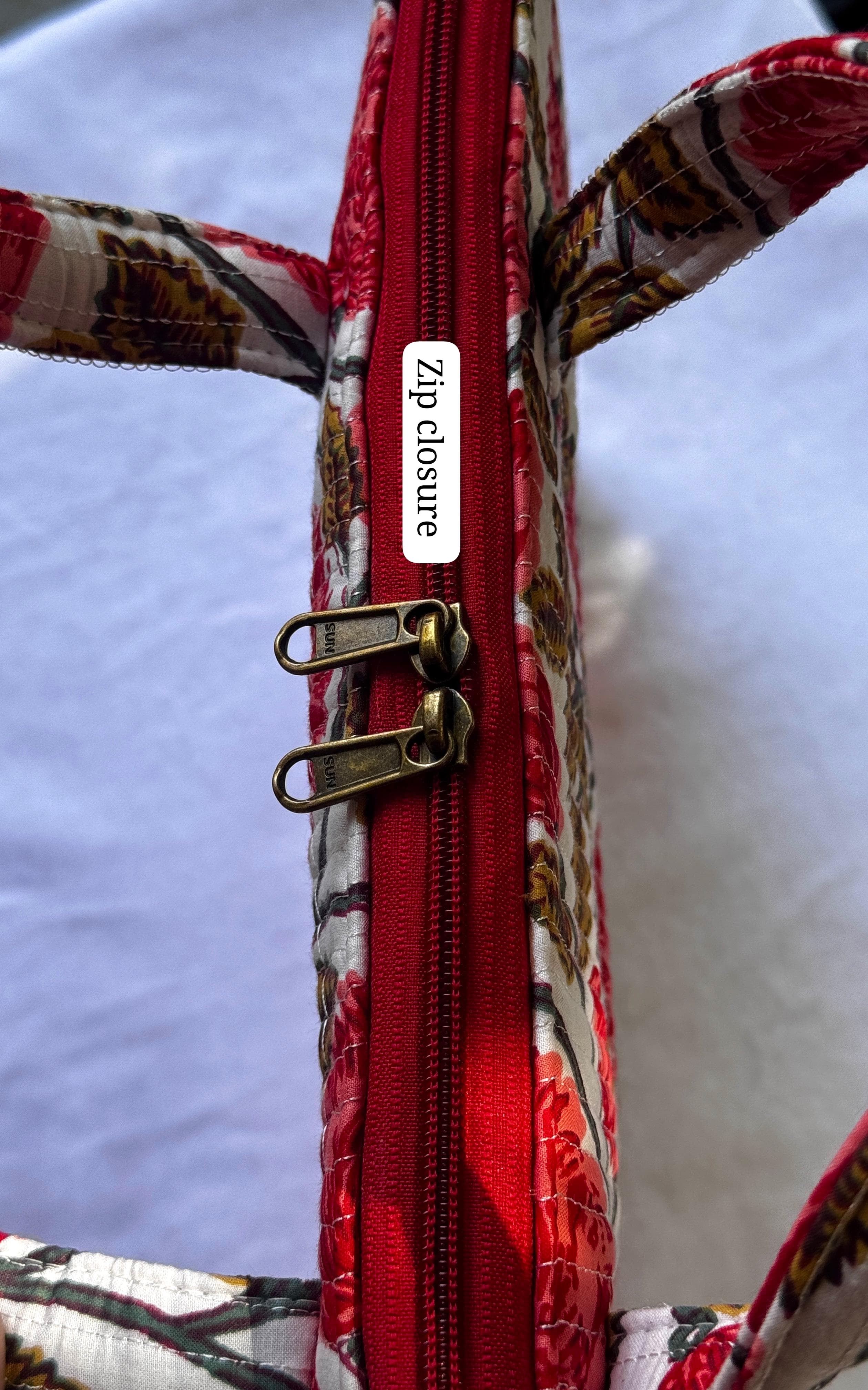 Quilted hand printed laptop bag