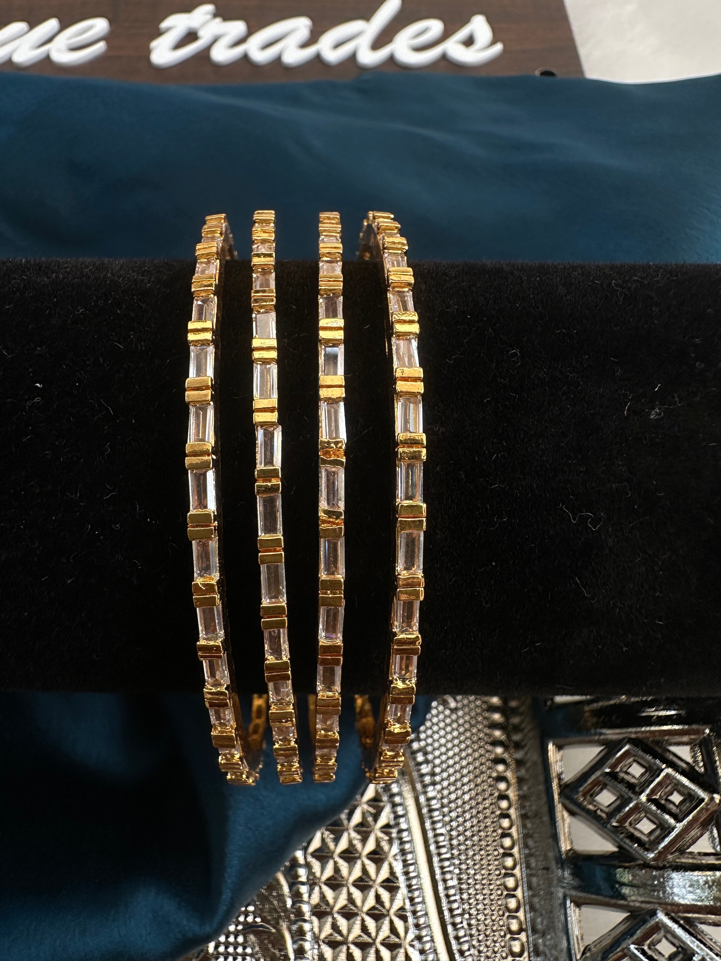 white kundan stone bangles